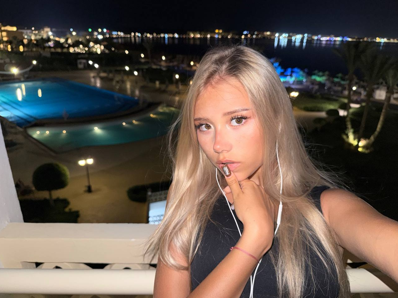 Pavlova at night by a pool
